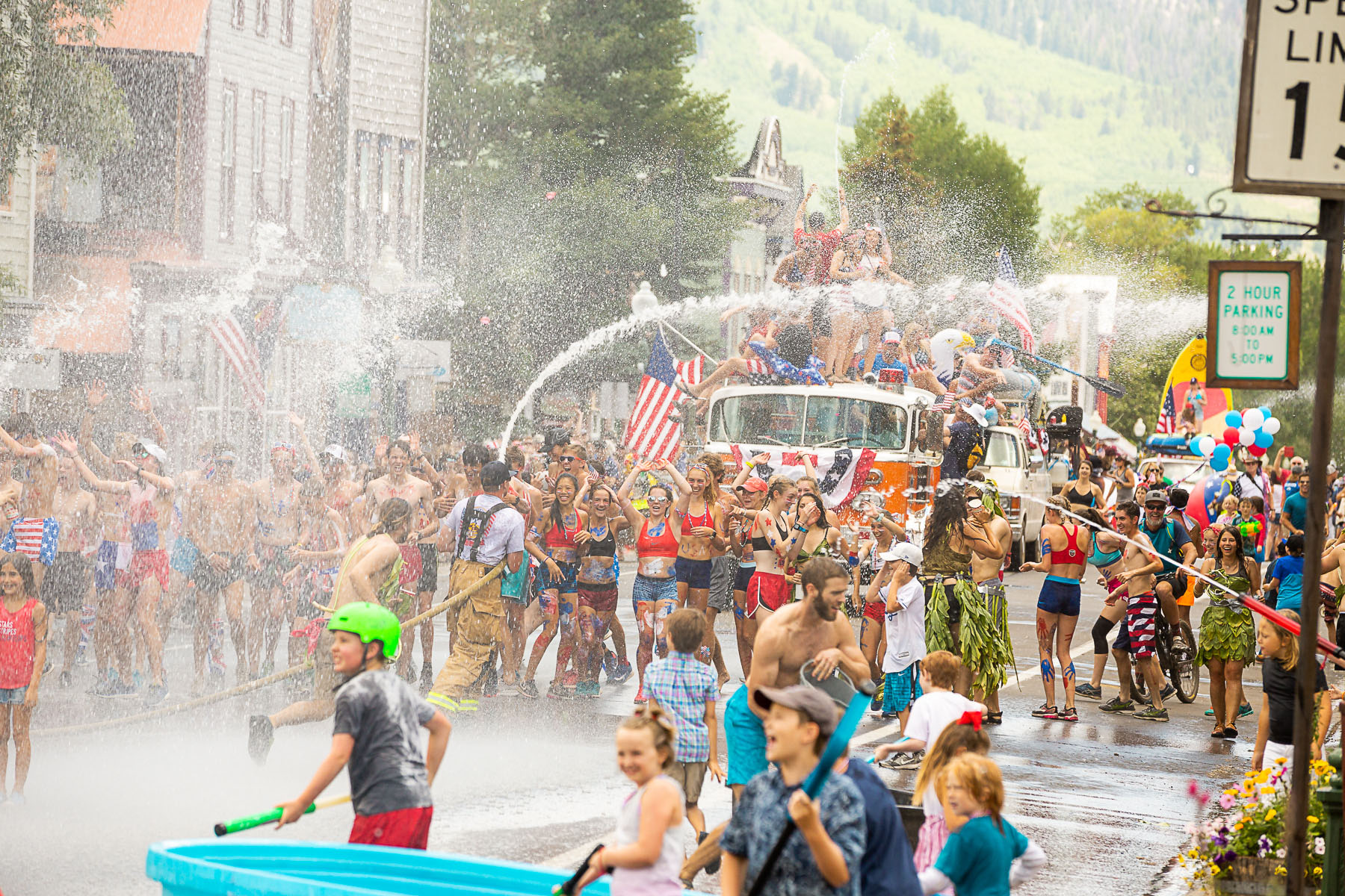 It's "Game On" as the water starts flying at the Crested Butte 4th of July Parade.